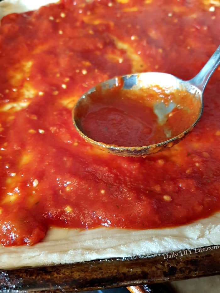 Making Homemade Pizza at home doesn't have to be overly complicated. I nice fresh dough that is packed with flavor, a great 20 Minute  Marinara Sauce, lots of melty cheese and loaded with the best toppings is the only thing you need for the perfect pizza. #HomemadePizzaDough #HomemadePizza #Pizza #Recipes #PizzaRecipe #PizzaPie #SquarePizza #PizzaDoughRecipe