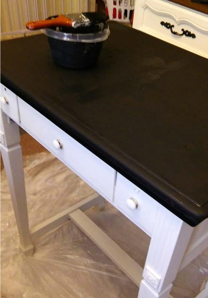 How to bring an old boring piece back to life with paint! This is the before of this sweet sewing table. Sure it has a few flaws, but we can fix that!