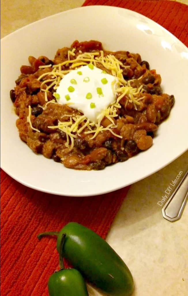 This 5 can Slow Cooker Chili is the perfect meal for cold, busy weeknights. Use up your leftovers to make it quick and simple. A delicious Round 2 recipe!