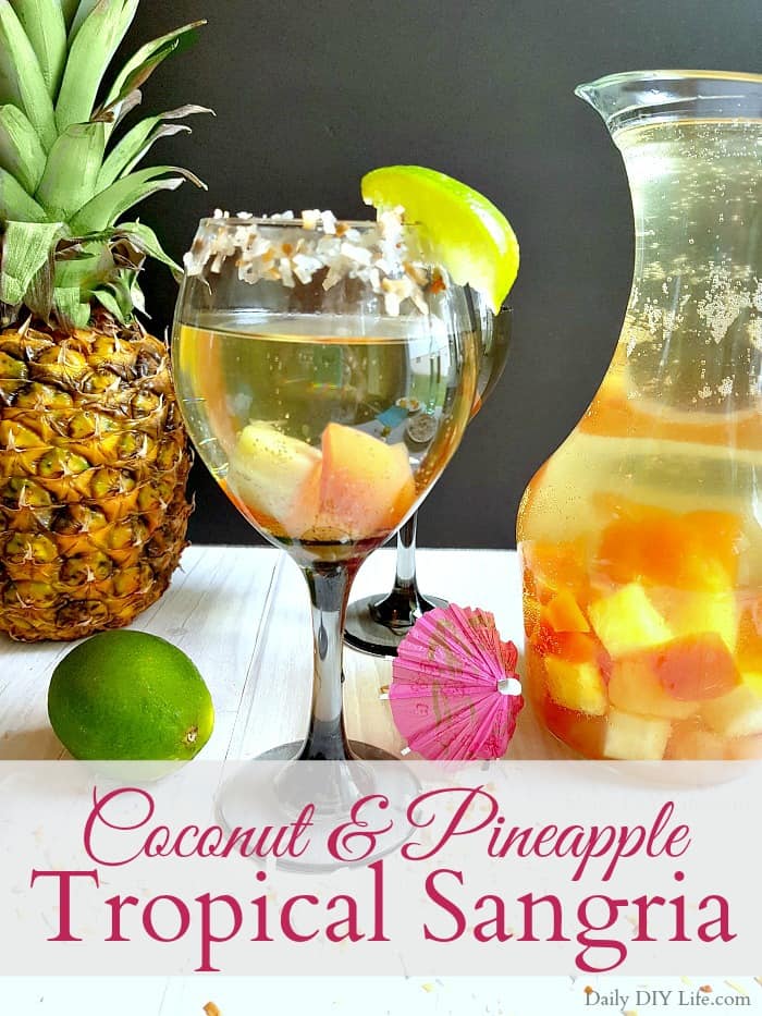 Tropical Sangria infused with refreshing pineapple coconut water is the perfect cocktail for those warm summer nights. Refreshing, crisp and full of your favorite tropical fruits. This sangria will transport your brain right to the islands. #SummerCocktails #Sangria #TropicalSangria #Wine #WineCocktail #TropicalDrinks 