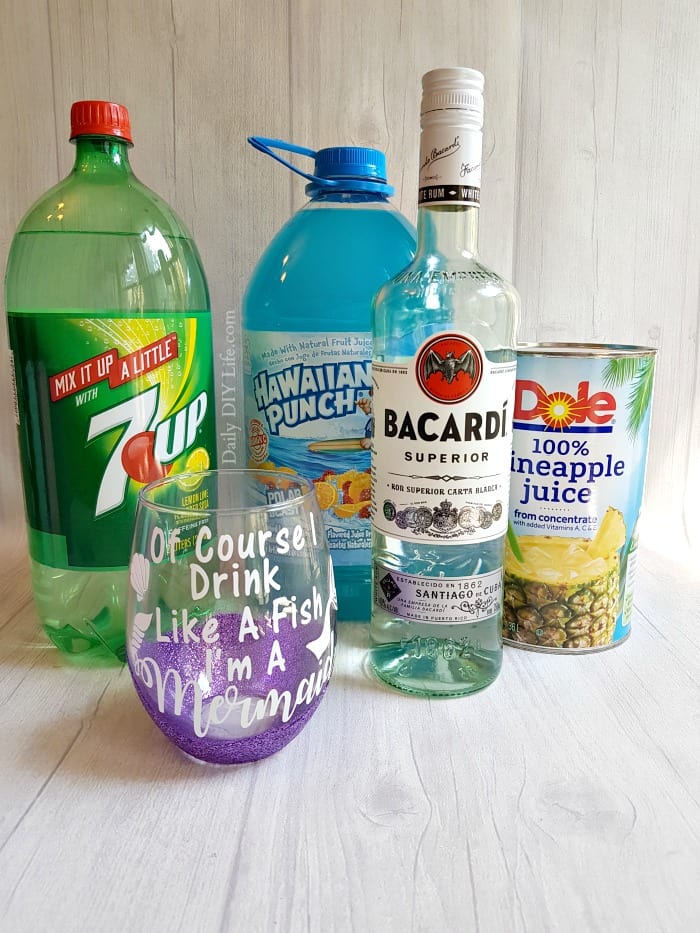 If you are looking for the perfect cocktail for those hot summer nights, look no further! Mermaid Rum Punch is sweet & refreshing. It can also be made as a mocktail for the kids too! You will be the hit of the party when you serve this one up. #Cocktails #mocktails #Rum #SummerCocktailSeries #SummerDrinks #Mermaid #MermaidRumPunch #21+ 