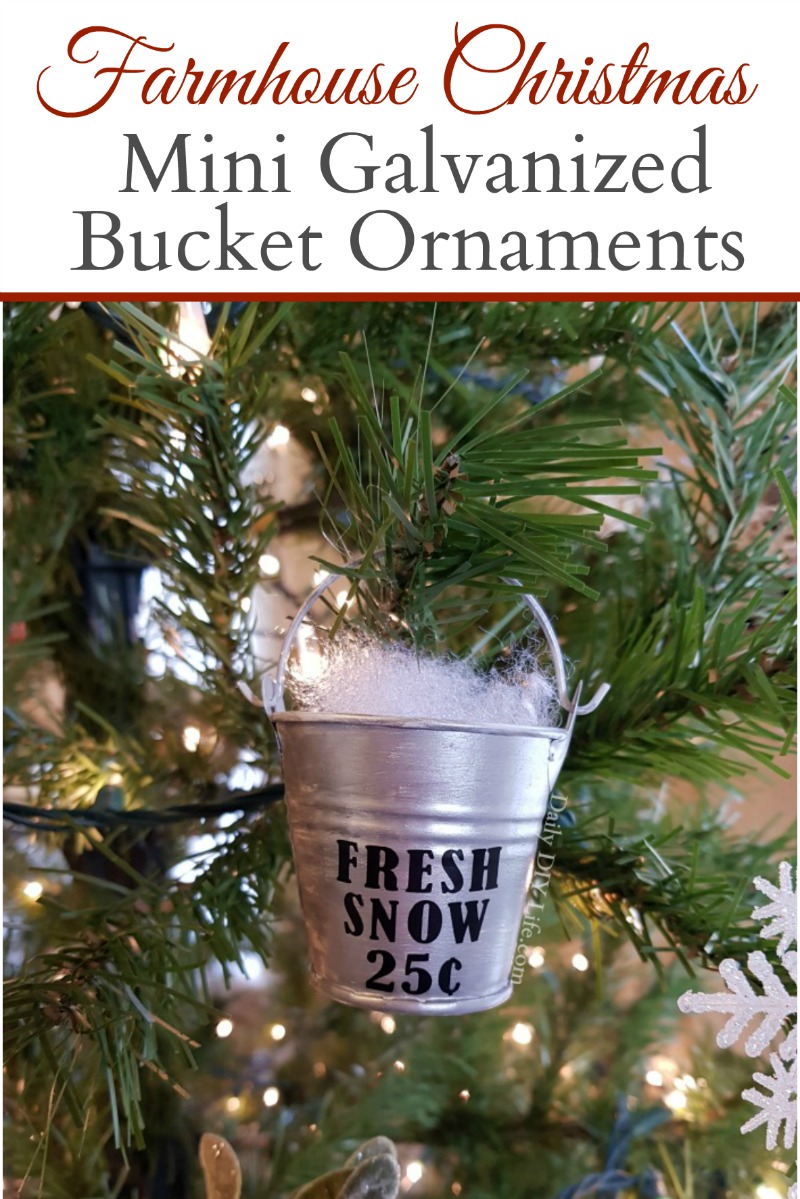 Farmhouse Style Christmas Ornaments that won't break the bank. These mini galvanized buckets are the perfect edition to your farmhouse Christmas tree. Using supplies from the dollar tree, your Cricut cutting machine and some glossy StyleTech Craft vinyl, you can customize each one with your favorite farmhouse saying. We all need a little fresh now at Christmas! #Sponsored #StyleTechCraft #StyleTech #GlossyVinyl #CricutMade #CricutChristmasCrafts #DIYChristmas #FarmhouseChristmas #DIYFarmhouseChristmas