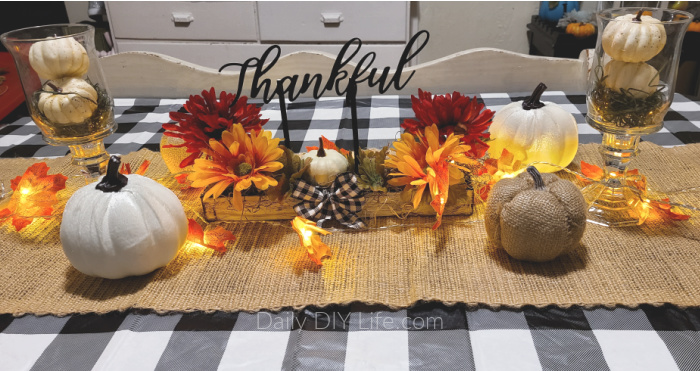 A Colorful Thanksgiving Centerpiece that will be the center of any perfect Thanksgiving celebration. Start with a faux wood base, then, use inexpensive items from Dollar Tree to make your beautiful Fall Centerpiece. I added simple flowers with all of the vibrant colors of fall. If you are looking for an easy Dollar Tree Thanksgiving Craft to make, this will be the perfect DIY project for you. #DollarStoreDivas #DollarTreeCrafts #FallDollarTree #FallDIY #CraftingWithDollarTree #Giveaway #FallColors