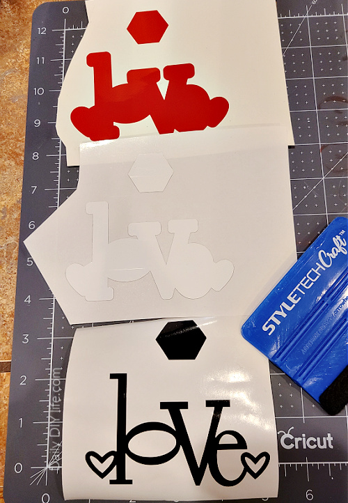 Layering vinyl perfectly does not have to be as intimidating as it sounds. Using the simple shape method, you can start layering vinyl on all of your cricut projects easily with a flawless and professional finish. Follow these simple steps, and start layering vinyl like a pro. #sponsored #StyleTechCraftVinyl #StyleTechCraft #GlossyVinyl #CricutMade #Cricut #CricutValentine #VinylTechniques #LayeredVinyl