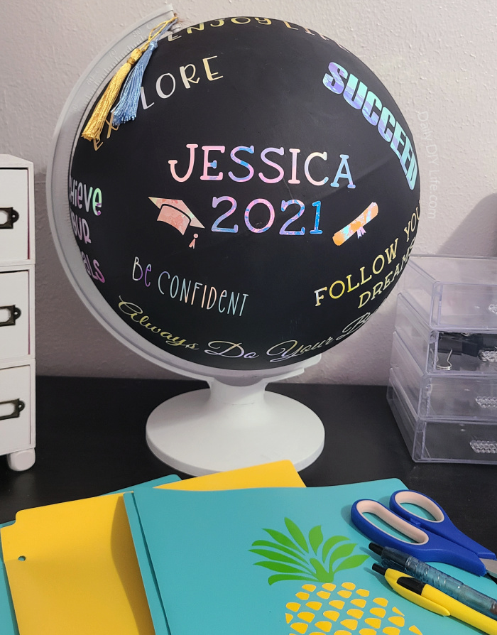 An inspirational graduation gift that is sure to wow the recipient. This easy DIY upcycle uses a thrift store globe, chalk paint, and gorgeous Opal Vinyl from StyleTech Craft in the school colors. Personalized graduation gifts are thoughtful, meaningful, and full of wonderful memories. #Sponsored #StyleTechCraft #OpalVinyl #DIYGraduationGift #GraduationGift #ThriftedUpcycle #GlobeCrafts #CricutMade #Cricut