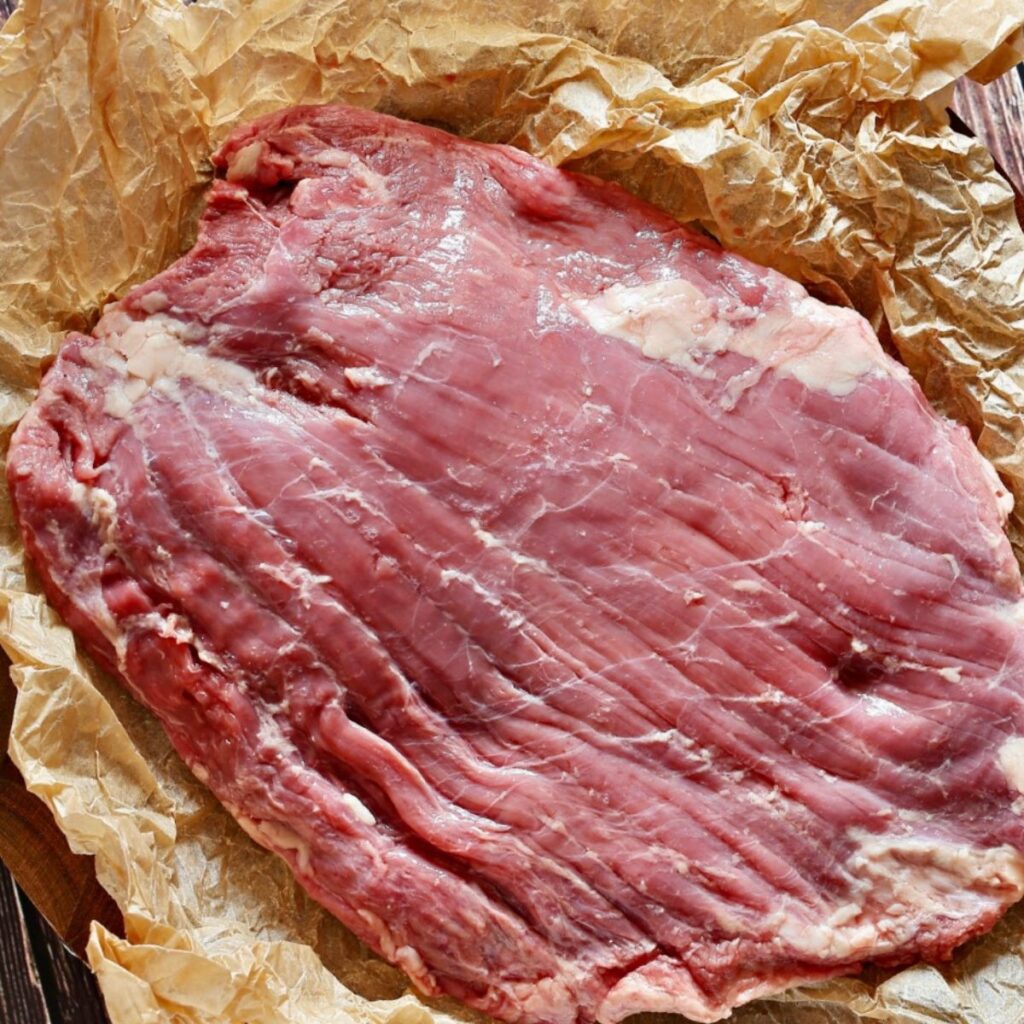 raw flank steak -sizzle steak