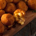 Mac and Cheese Bites on a cutting board