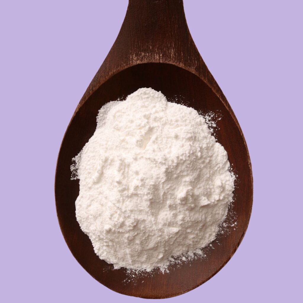 Ammonium Bicarbonate on a large wooden spoon