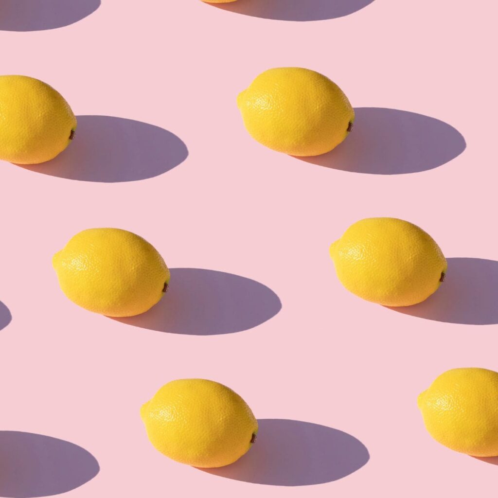 lemons-on-pink-background