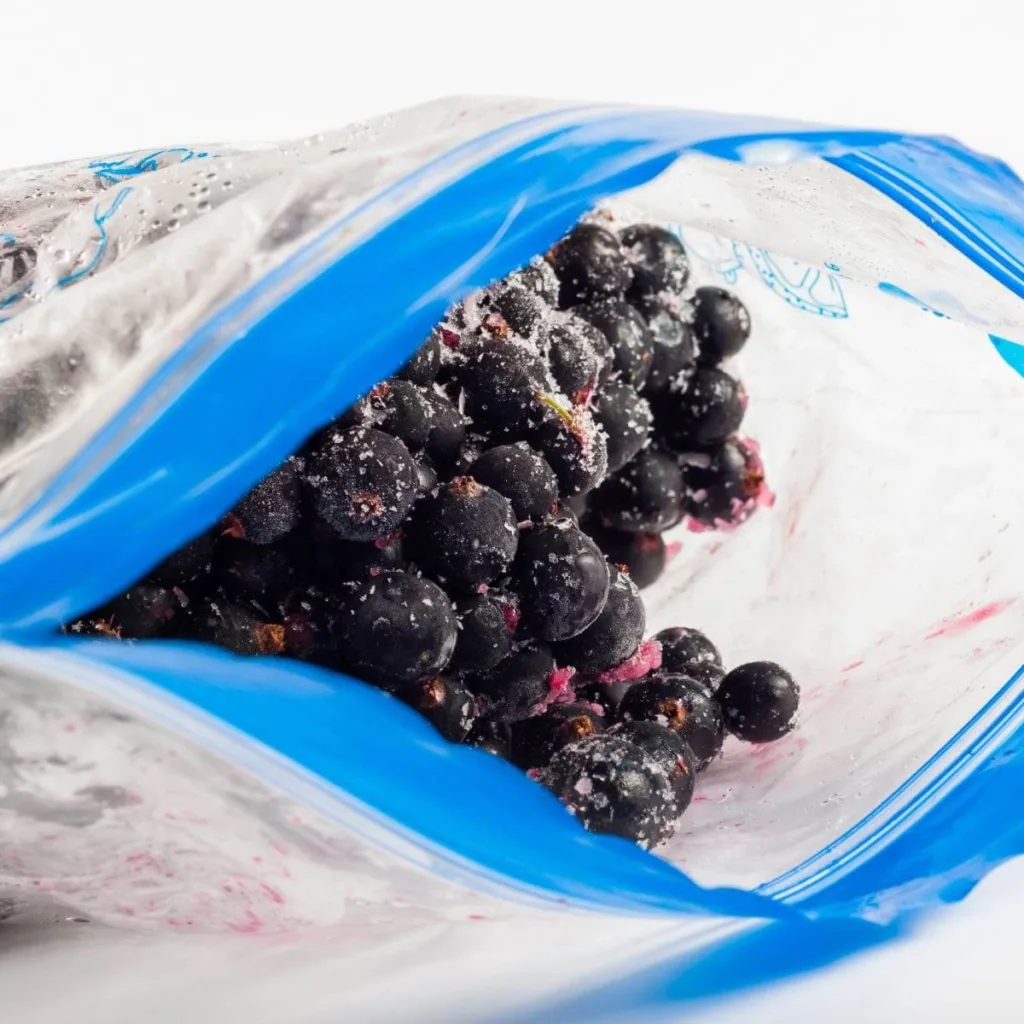 frozen blueberries in a ziploc bag
