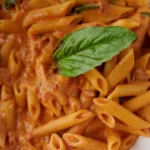 close up of penne with blush cream