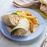 subway tuna fish in a wrap with fries